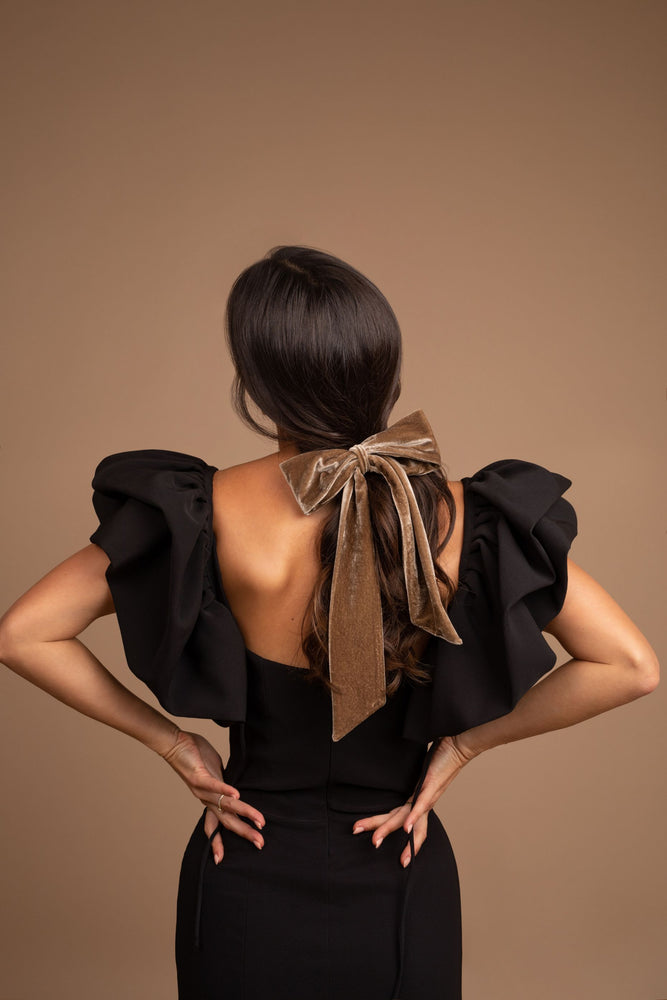 
                  
                    Earthy Velvet Bow Barrette on brunette woman with elegant black dress
                  
                